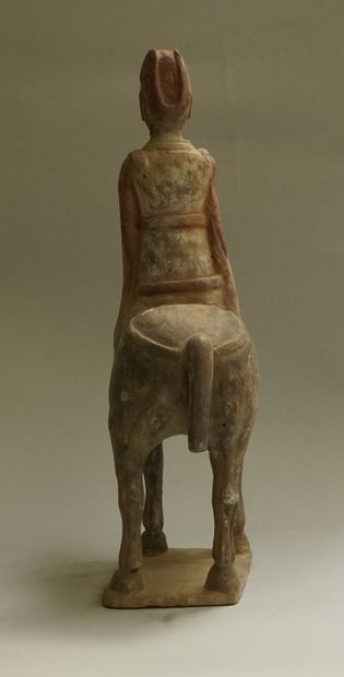 Beige terracotta rider with black, white...