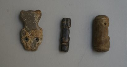 Set of 3 grey and black stone amulets. 

Taino,...