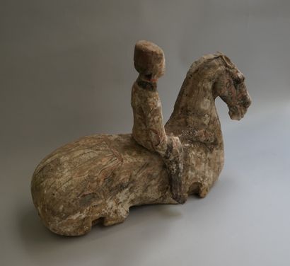 Legless horse with rider in polychrome terracotta....
