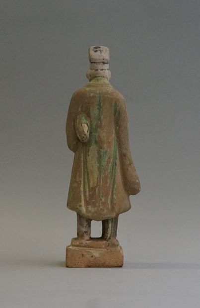 A polychrome and green-glazed earthenware...