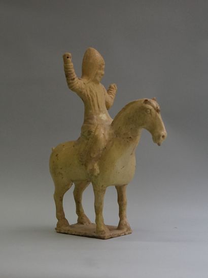 Terracotta rider with a limewood glaze. 

Early...