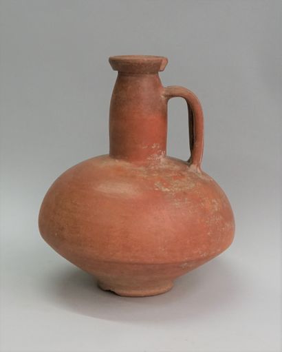 Large orange terra cotta bottle with handle.

Roman...