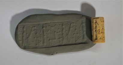 Beige stone cylinder seal decorated with...