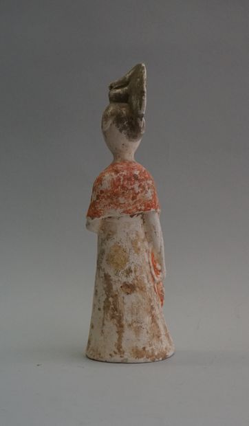 A beige terracotta court lady with white,...