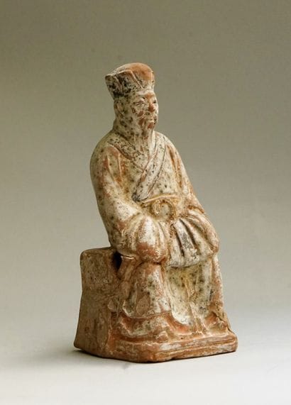 Votive house with character in green and...