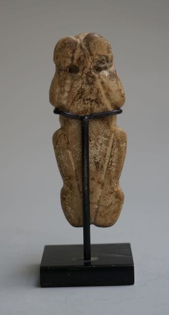 Zemi amulet in beige stone. 

Taino, before...