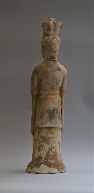 A beige terracotta dignitary or court officer...