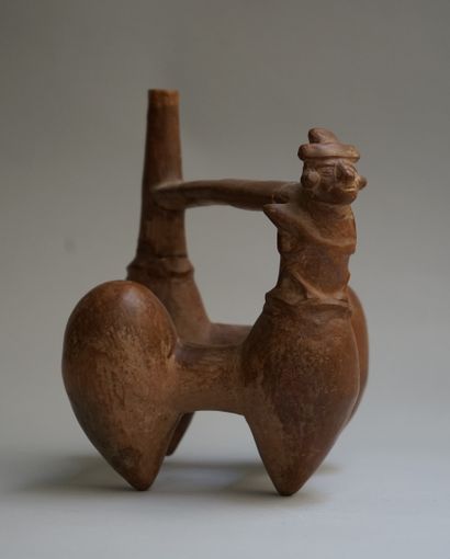 Whistling vase with four fruit-shaped feet,...