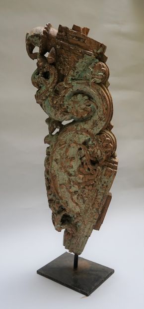 An architectural element in carved wood with...