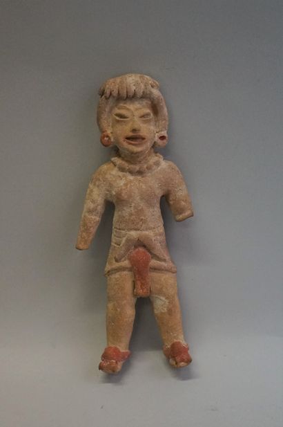 Standing male figure wearing a loincloth....