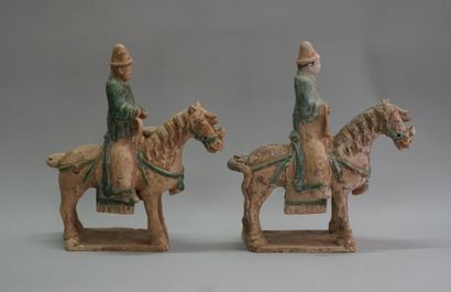 Two musicians on horseback in beige terracotta...
