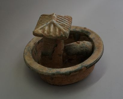 Representation of a pigsty in beige terracotta...