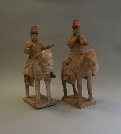 Set of four white, red and black polychrome...