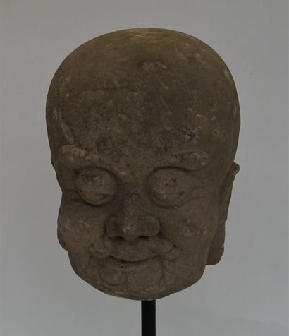 Arhat head in grey stone. 

Ming, 1368-1644...