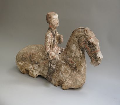 Legless horse with rider in polychrome terracotta....
