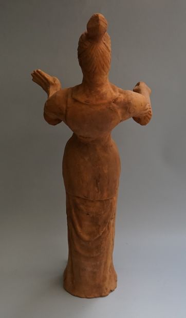 Lokapala made of orange-coloured terracotta....