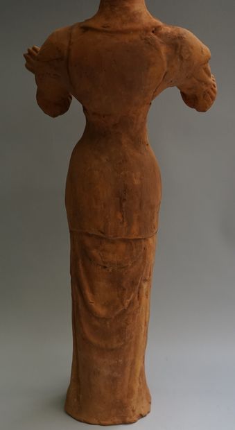 Lokapala made of orange-coloured terracotta....