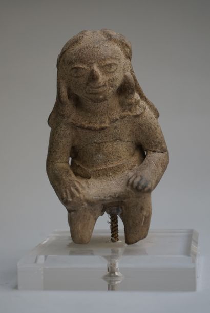Anthropomorphic statuette showing a female...