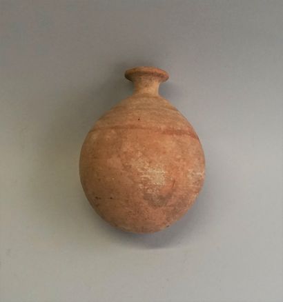 Beige terracotta ball vase decorated with...