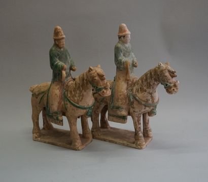 Two musicians on horseback in beige terracotta...
