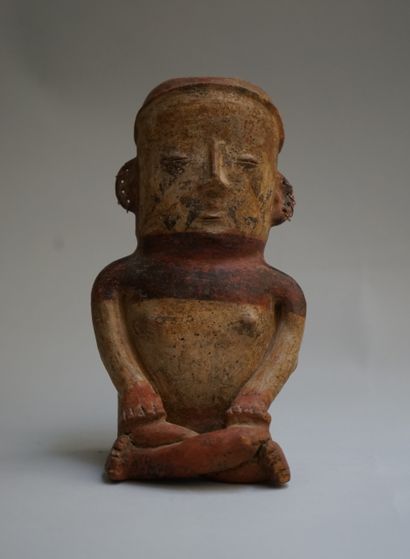 Anthropomorphic figure of a seated woman...