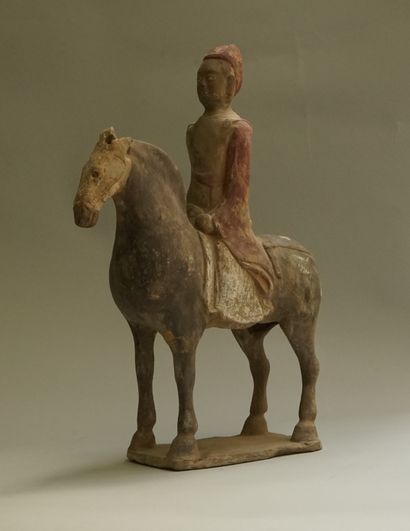 Beige terracotta rider with black, white...