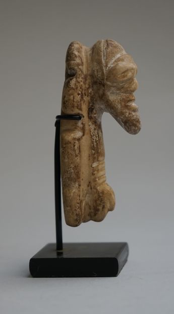 Zemi amulet in beige stone. 

Taino, before...