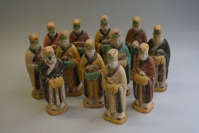 Set of 12 statuettes showing the bearers...