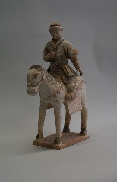 Archer (or soldier?) on horseback in white...