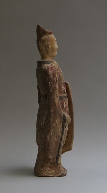 Beige terracotta warrior with red, black...