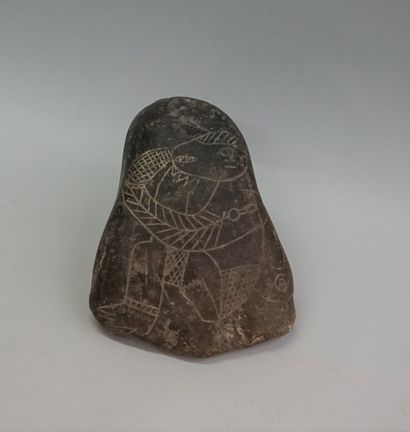 Engraved stone fragment of a figure struggling...