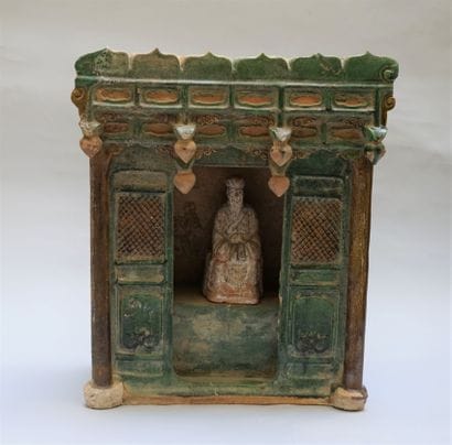 Votive house with character in green and...