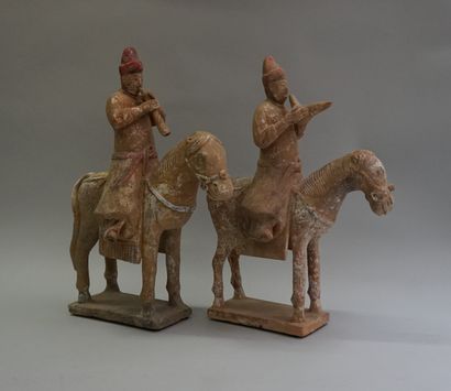 Set of four white, red and black polychrome...