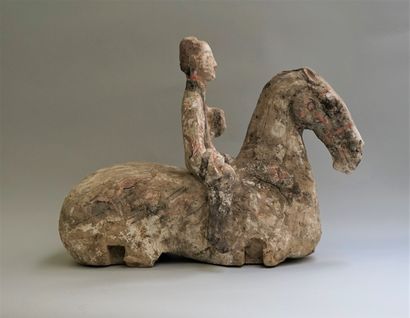 Legless horse with rider in polychrome terracotta....
