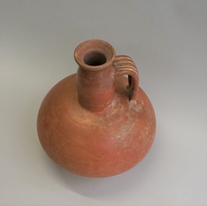 Large orange terra cotta bottle with handle.

Roman...