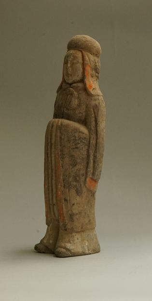 Grey terracotta dignitary with brown, white...
