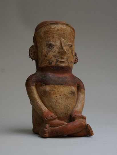 Anthropomorphic figure of a seated woman...