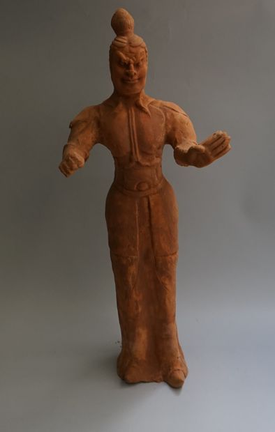 Lokapala made of orange-coloured terracotta....