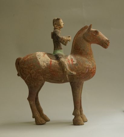 White, red, black and green polychrome terracotta...