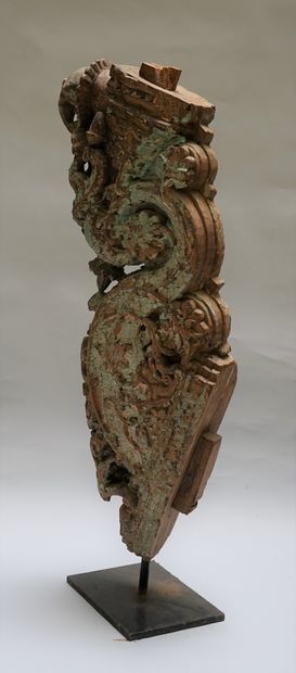 An architectural element in carved wood with...