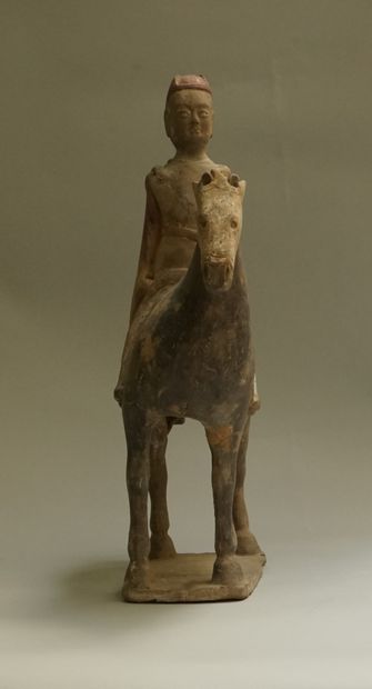 Beige terracotta rider with black, white...