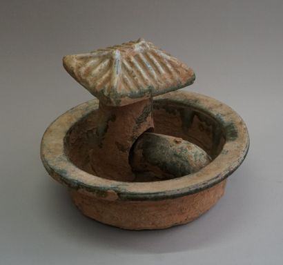 Representation of a pigsty in beige terracotta...