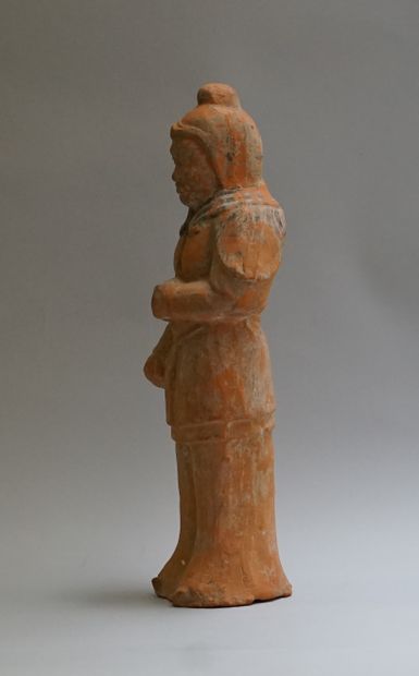 Orange terracotta warrior with remains of...