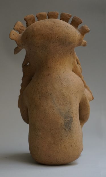 Anthropomorphic figure showing a seated high...