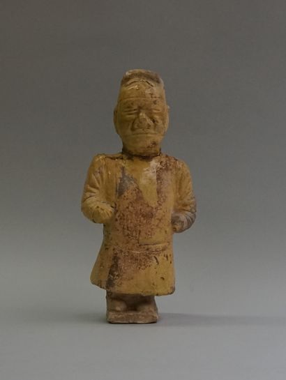 Terracotta dwarf with remnants of lime glaze...
