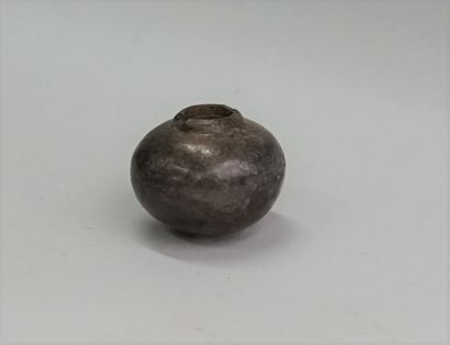 Brown terracotta ball vase.

Colombia, 1st...