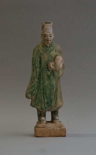 A polychrome and green-glazed earthenware...