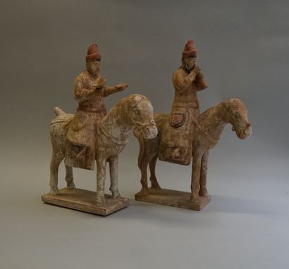 Set of four white, red and black polychrome...