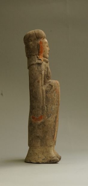 Grey terracotta dignitary with brown, white...