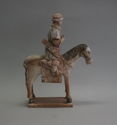 Archer (or soldier?) on horseback in white...
